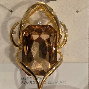 Gold tone slide with Swarovski crystals